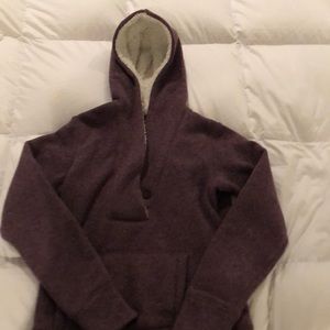 A medium fluffy, purple hoodie in great shape.